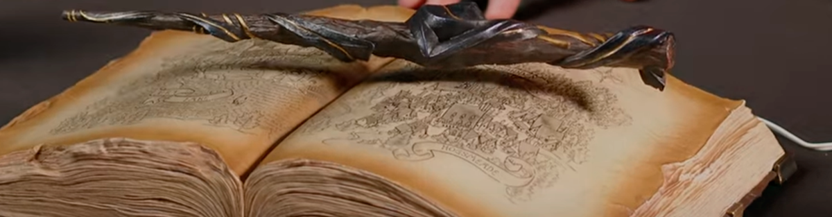 The collection includes a full-scale magic wand that floats above the book!